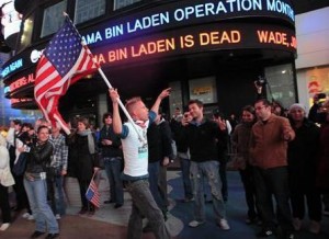 People react to the death of Osama bin Laden in Times Square in New York early May 2, 2011. Photo: Reuters 