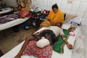 Limon, lying on hospital bed. Photo: bdnews24.com 