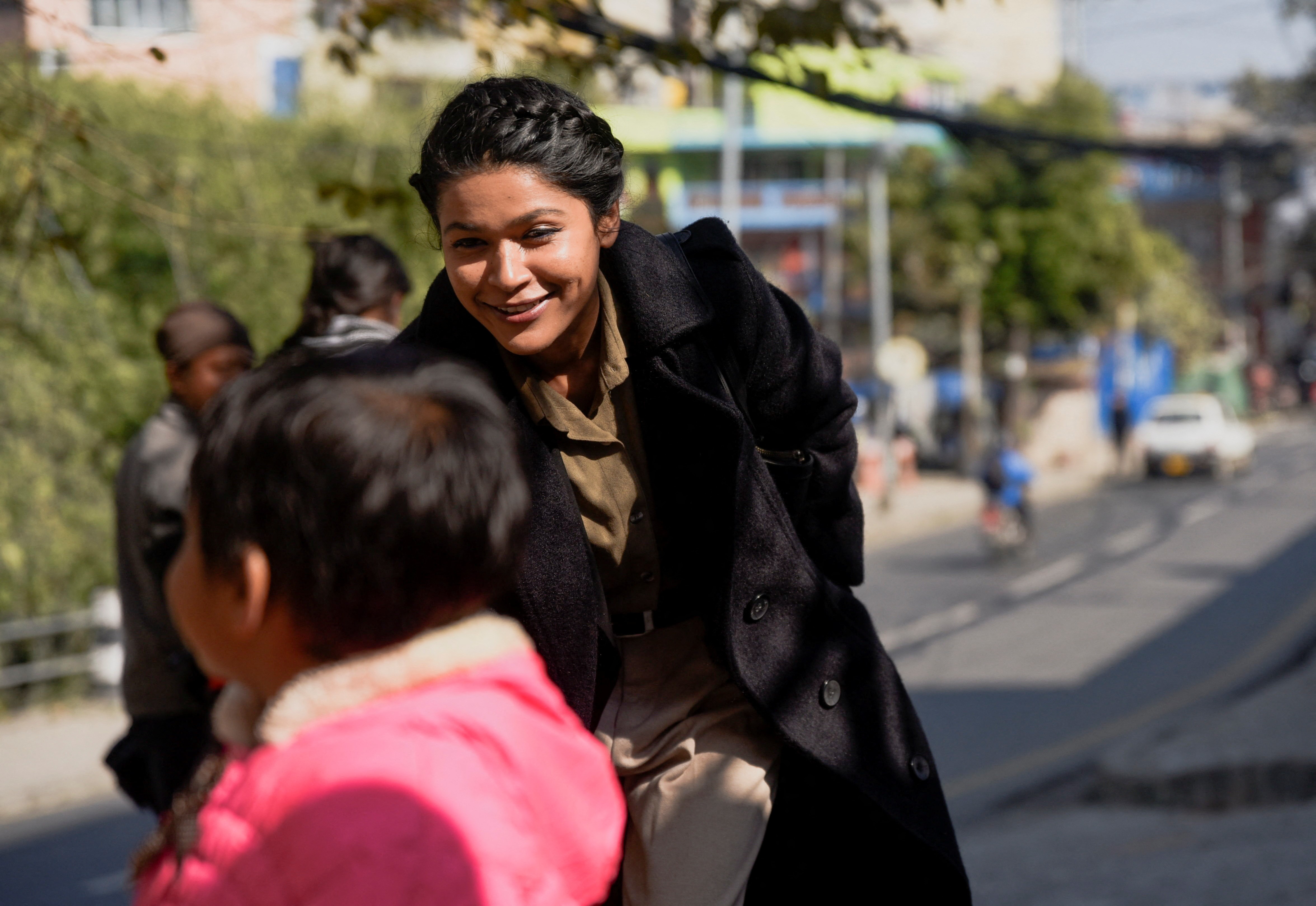 Nihita Biswas, who claims to be the wife of Charles Sobhraj, a French national known as 'The Serpent', suspected of killing over 20 Western backpackers across Asia, walks outside the Department of Immigration as Sobhraj is taken inside after his release from prison, following an order of Nepal's Supreme Court, in Kathmandu, Nepal, Dec 23, 2022.  REUTERS/Monika Malla