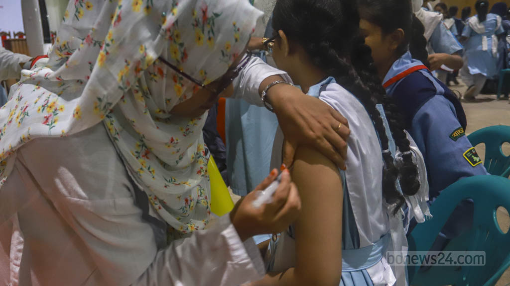 Oct 15: The vaccination of girls against the human papillomavirus, which causes cervical cancer, begins. Photo taken at Viqarunnisa Noon School and College.  Photo: Twhiduzzaman Tapu