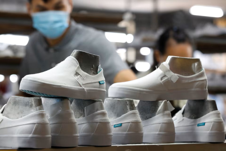 Shoes for export are seen at a shoe factory in Hanoi, Vietnam December 29, 2020.  REUTERS