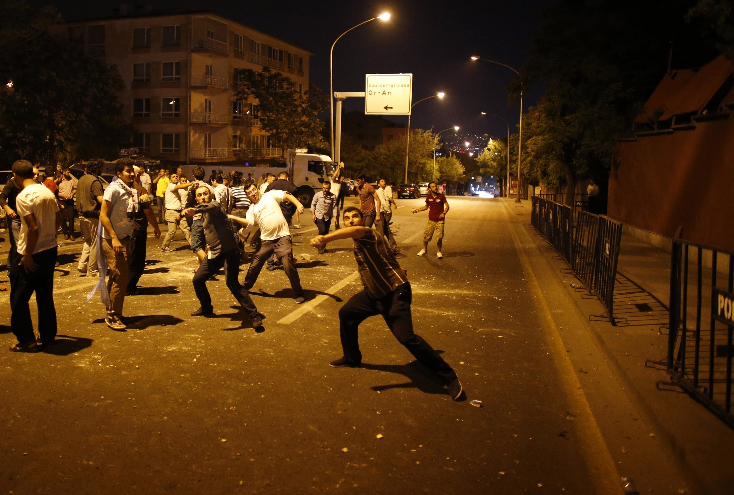 Demonstrators throw stones at the Israeli Embassy in Ankara, as they protest against Israel's military action in Gaza, July 18, 2014. Demonstrators throw stones at the Israeli Embassy in Ankara, as they protest against Israel's military action in Gaza, July 18, 2014.