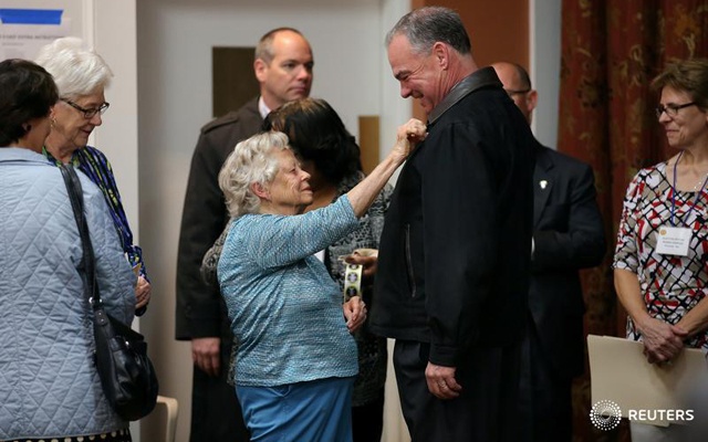Democratic US vice presidential candidate Senator Tim Kaine gets an 'I voted' sticker after casting his ballot at the Hermitage Methodist Home polling station in Richmond, Virginia. 
