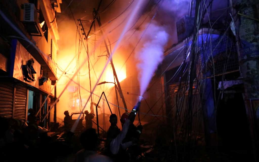 Firefighters work at the scene of a fire that broke out at a chemical warehouse in Dhaka, Bangladesh February 21, 2019. Reuters 