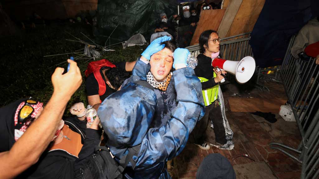 Israel backers attack pro-Palestinian camp at UCLA, as NYC police