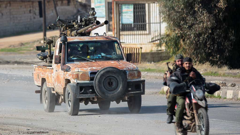 As Syrian rebels sweep into Aleppo, army closes airport, roads