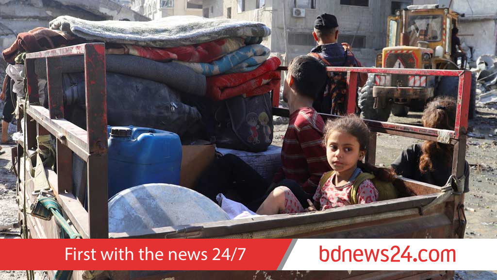 Families leave Gaza City after night of bombardment, Israelis protest