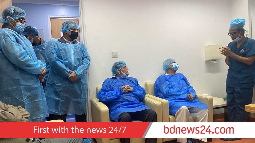 Yunus visits Khaleda in hospital