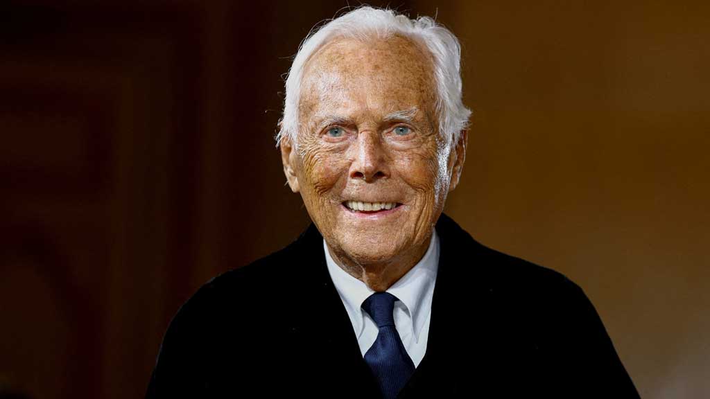 Recovering Giorgio Armani says he will be back in September