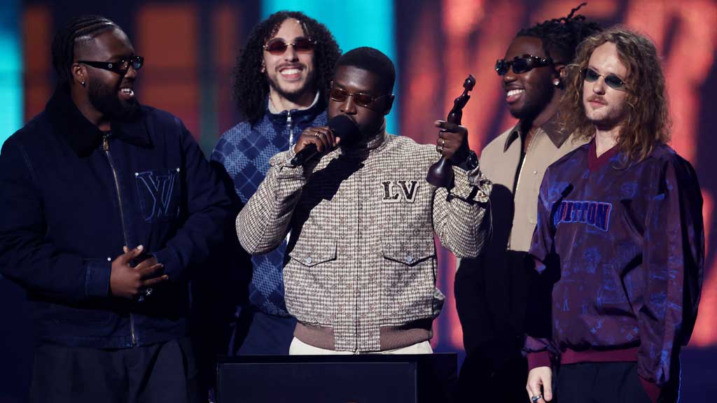 Members of the Ezra Collective receive the Group of the year award during the BRIT Awards at the O2 Arena in London, Britain, Mar 1, 2025. REUTERS/Isabel Infantes