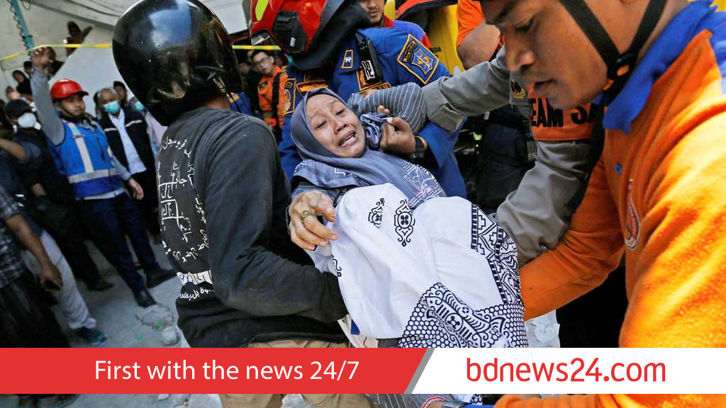 At least 50 bodies recovered after Indonesian school collapse, 13 remain missing