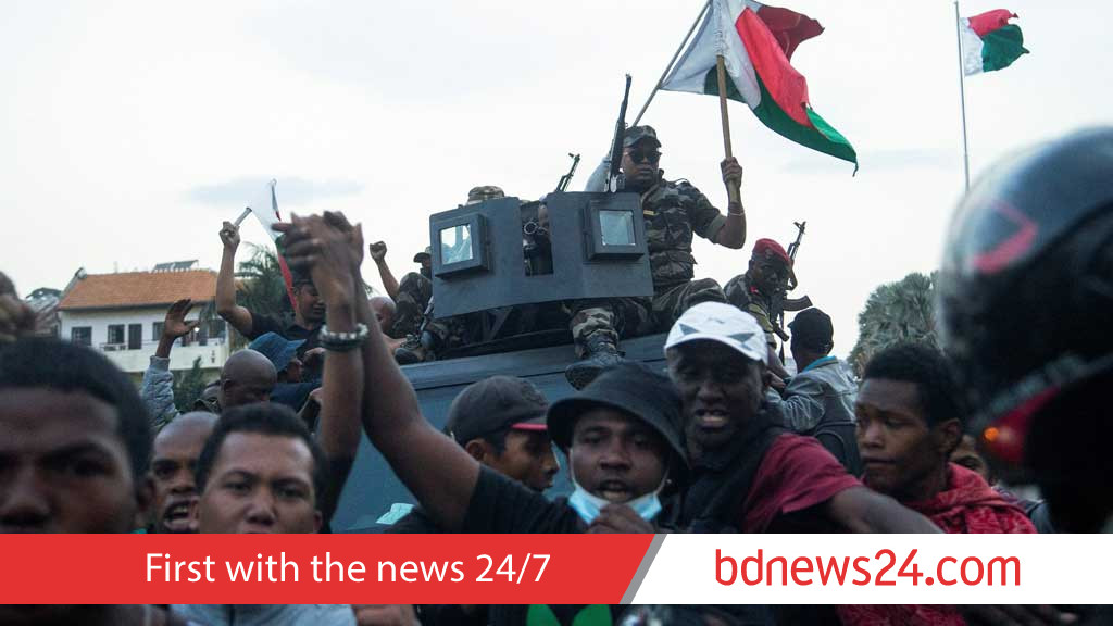Madagascar president warns of attempted coup after soldiers join protests