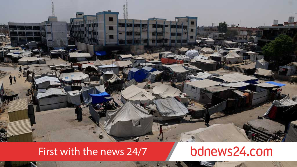 Israeli military urges Gaza City residents to leave, bombs high-rise tower