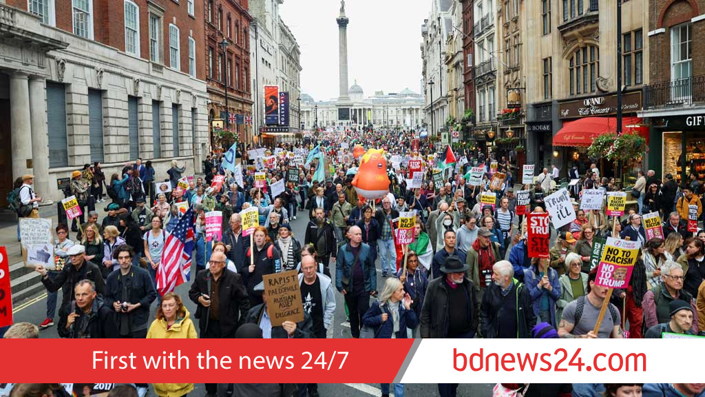 Anti-Trump protesters march through London as president basks in royal welcome