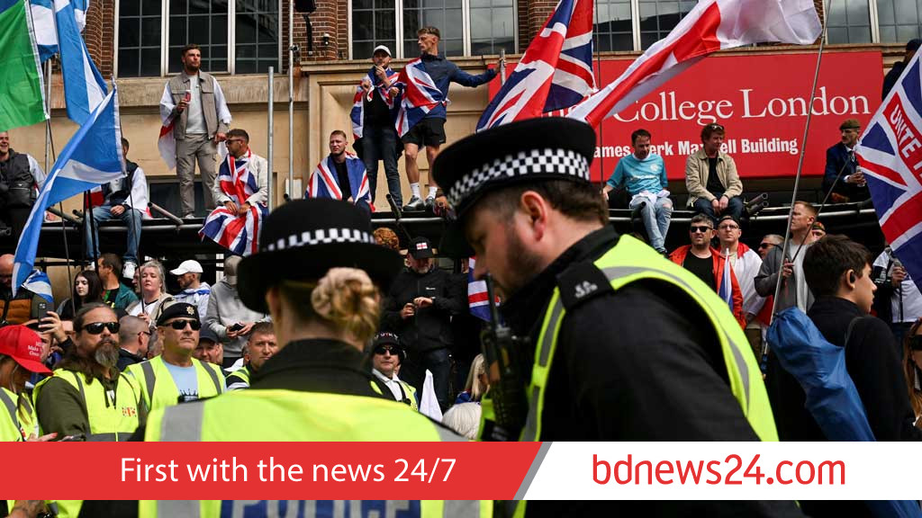 Tens of thousands gather for London anti-immigration march and counter protest