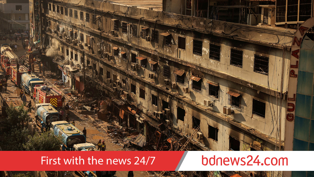 57 feared dead as rescue workers clear Karachi inferno ruins